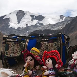 Peru. Feliz Viaje. Local souvenir dolls at the Puno les desea feliz viaje pass