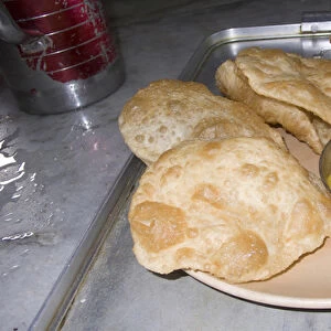 Plate of Indian fried bread (nan) and dal in northeastern India