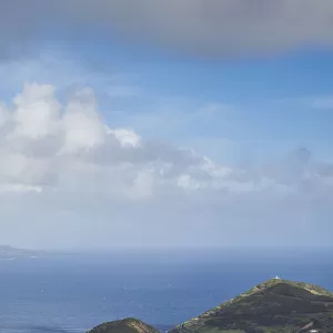 Portugal, Azores, Faial Island, Horta. Elevated view of Porto Pim, Monte Quelmado