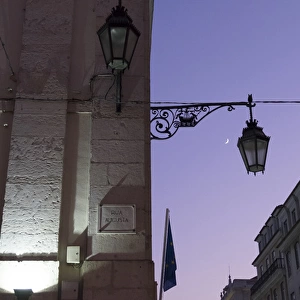 Portugal, Lisbon. Wrought iron street lights along Rua Augusta