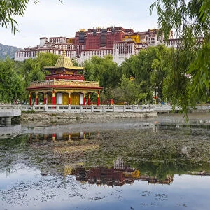 Potala Palace (UNESCO World Heritage site) with reflection in the lake water, Lhasa