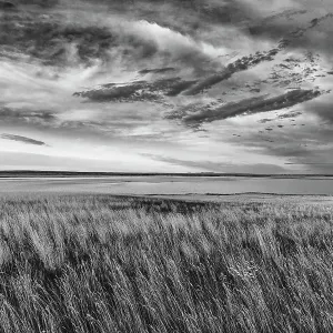 Prairie grasslands and Lake Bowdoin at Bowdoin National Wildlife Refuge near Malta, Montana, USA. (Editorial Use Only) Prairie grasslands and Lake Bowdoin at Bowdoin National Wildlife Refuge near Malta, Montana, USA. (Editorial Use Only)