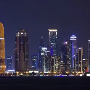 Qatar, Doha, Doha Bay, West Bay skyscrapers, dusk, with Burj Qatar Tower