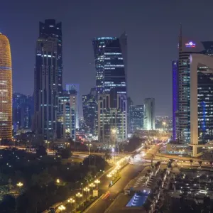 Qatar, Doha, Doha Bay, West Bay Skyscrapers, elevated view, dusk