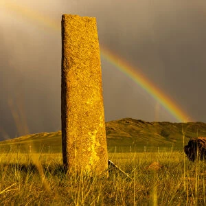 Rainbow over Deer stones with inscriptions, 1000 BC, Mongolia
