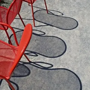 Red Wire Chairs Shadows Print on Concrete Red Wire Chairs Shadows Print on Concrete