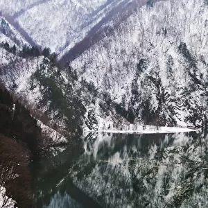 Reflection of mountain covered with snow in the lake, Gifu Prefecture, Japan