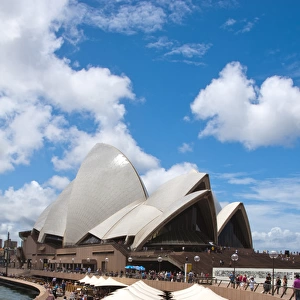 Restaurant and umbrellas in area of famous Sydney Opera House in harbour in New South
