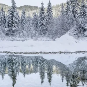 River Isar near Sylvenstein Reservoir close to village in the Karwendel mountain range during winter. Germany, Upper Bavaria