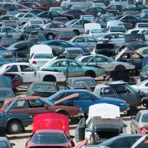 Rows of old wrecked cars in junk yard near Alexandra Louisana parts and repairs for autos