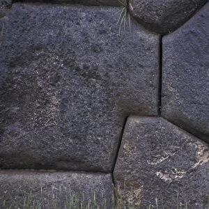 SA, Peru, Sacayhuaman Inca ruins; distinctive zig-zag terraced walls, some stones