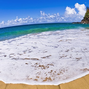 Sand and surf at Hanakapi ai Beach along the Kalalau Trail, Na Pali Coast, Island of Kauai