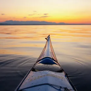 Sea kayak bow view of the Olympic Mountains on Puget Sound, Seattle, Washington State, USA Sea kayak bow view of the Olympic Mountains on Puget Sound, Seattle, Washington State, USA