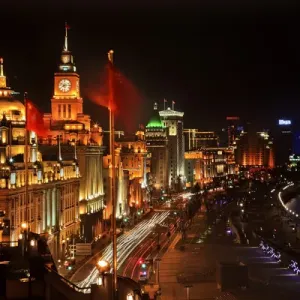 Shanghai China Bund at Night Cars, Flags Trademarks Obscured Shanghai China Bund at Night Cars, Flags Trademarks Obscured