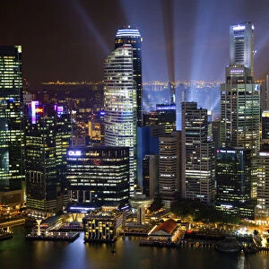 Singapore. Searchlights and city building at night