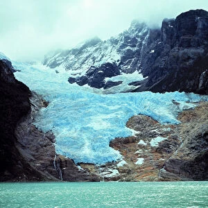 South America, Chile, Ultima Esperanza Fjord. The blue ice of Balmaceda Glacier creeps