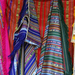 South America, Ecuador, Otavalo. Textiles. cloths, blankets, scarves, and hammocks