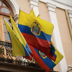 South America, Ecuador, Pichincha province, Quito. National flags of Ecuador hang