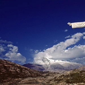 South America, Peru, Yungay. A huge statue of Christ, marks the site of the 1970