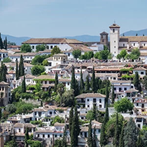 Spain, Andalusia. Granada. VIew from the Alhambra gardens across town to the mirador