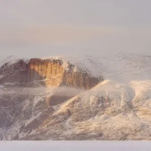 Storen Island, frozen into the sea ice of the Uummannaq fjord system during winter Storen Island, frozen into the sea ice of the Uummannaq fjord system during winter