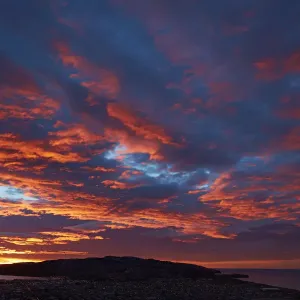 Sunrise over Otago Harbor and Pacific Ocean, Dunedin, South Island, New Zealand Sunrise over Otago Harbor and Pacific Ocean, Dunedin, South Island, New Zealand