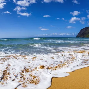 Surf and sand at Polihale Beach, Polihale State Park, Island of Kauai, Hawaii USA