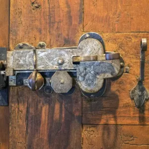 Switzerland, Bern Canton, Spiez, Spiez Castle, wood door with ornate hardware
