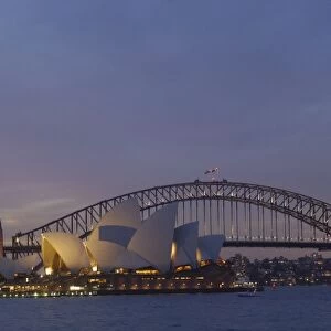 Sydney Opera House with Sydney Harbour Bridge at dusk. Sydney NSW AUSTRALIA