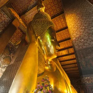 La Thaïlande, Bangkok. Bouddha couché à l'intérieur du Wat Pho. La Thaïlande, Bangkok. Bouddha couché à l'intérieur du Wat Pho.