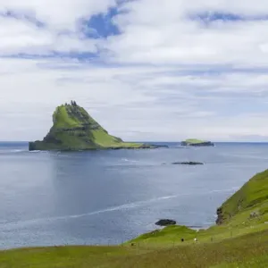 Tindholmur in the Sorvagsfjordur. The island Vagar, part of the Faroe Islands