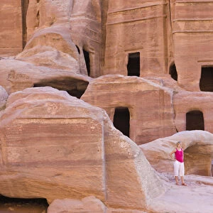 Tourist with Uneishu Tomb, Petra, Jordan (UNESCO World Heritage site)
