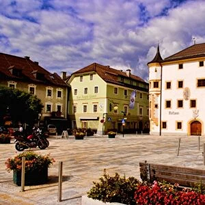 Town square in Mauterndorf Austria with flowers and colorful buildings