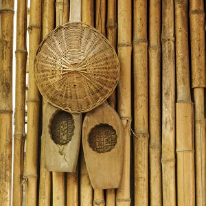 Traditional Chinese woven hat on bamboo wall, Guilin, China