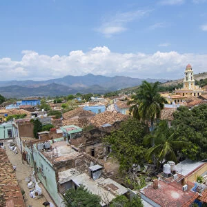 Trinidad Cuba from above tower with church and mountains with buildings of tile roofs