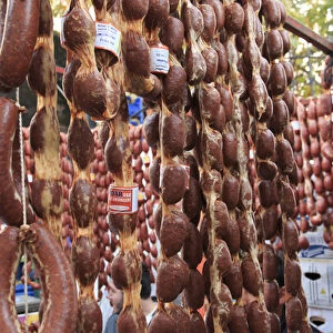 Turkey, Izmir Province, Kusadasi. Meat vendor at outdoor market