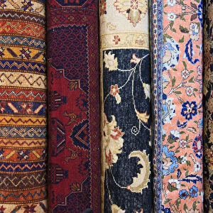 Turkey, Izmir Province, Selcuk, rolled and stacked rugs