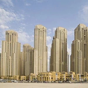 United Arab Emirates, Dubai, Marina. Jumeirah Beach Residence buildings behind beach