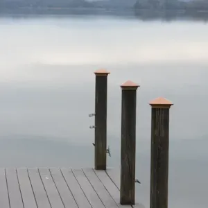 US, TN, Watts Bar Lake. Glass calm reflects cloud patterns