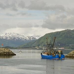 USA, Alaska, Kodiak, Fishing Boat Leaving St. Herman Harbor