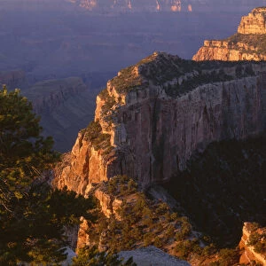 USA, Arizona, Grand Canyon National Park, North Rim, Sunrise light brightens Wotans Throne