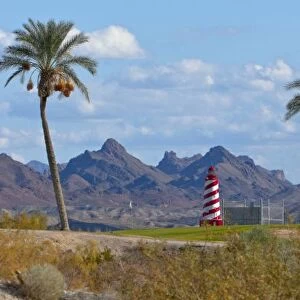 USA, Arizona, Lake Havasu City. Lighthouse next to golf course is replica of one in Michigan