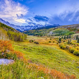 USA, Colorado, Sneffels Range. Sunset on mountain and valley autumn landscape