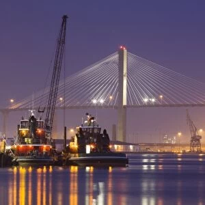 USA, Georgia, Savannah, Talmadge Memorial Bridge and tug boats on the Savannah River
