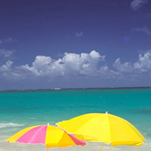 USA, Hawaiian Islands. Beach chair and umbrellas