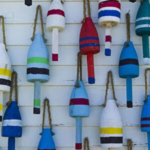 USA, Maine, Stonington, decorative lobster buoys