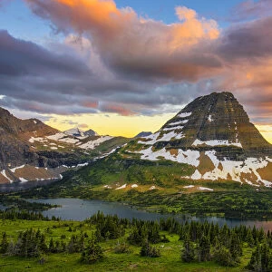 USA, Montana, Glacier National Park. Bear Hat Mountain and Hidden Lake at sunset