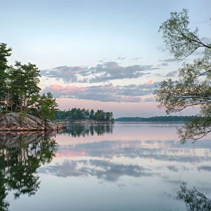 USA, New York State. Calm summer morning on the St. Lawrence River, Thousand Islands