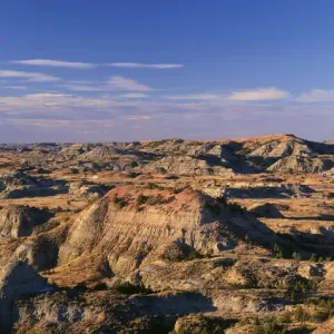USA, North Dakota, Theodore Roosevelt National Park, Evening light defines eroded