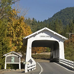 USA, Oregon, Cottage Grove. View of the historic Grave Creek Covered Bridge. Credit as